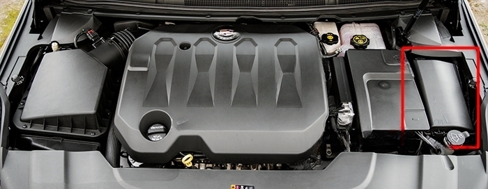 The location of the fuses in the engine compartment: Cadillac XTS (2013-2018)