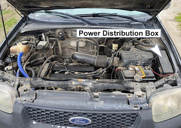 Ford Escape (2001-2004): Engine compartment fuse box location