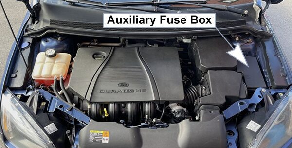 ford focus (eu) ap/c307 (2007): engine compartment fuse box location
